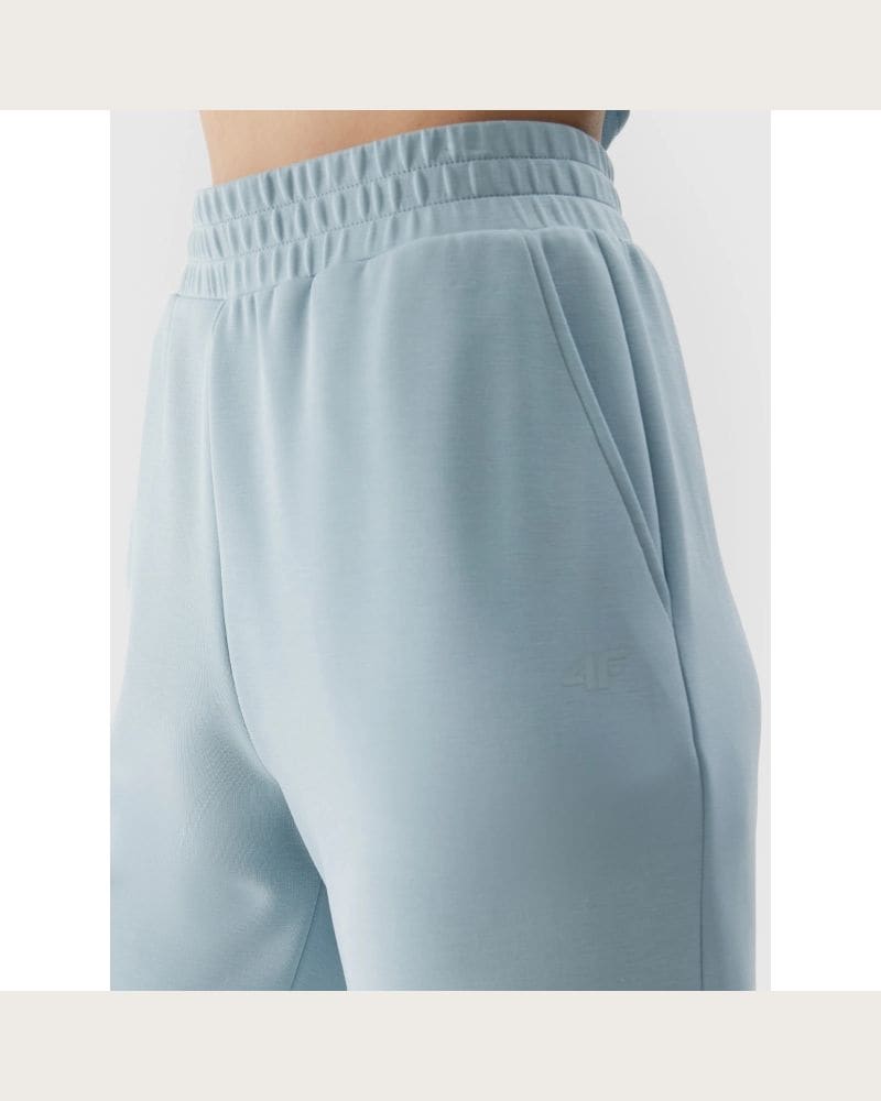 Dámske tepláky 4F TROUSERS-4FWSS24TTROF642-34S-LIGHT BLUE – fotka 6