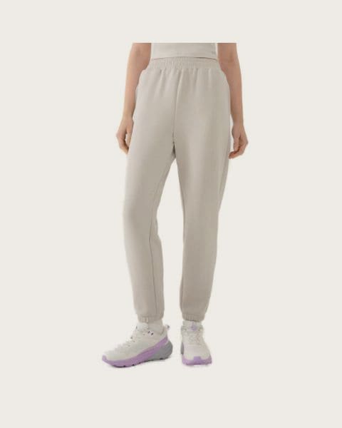 Dámske tepláky 4F TROUSERS CAS F1010-83S-BEIGE