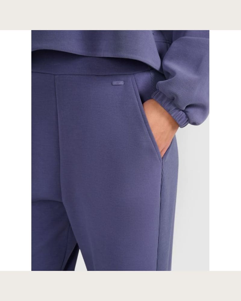 Dámske tepláky 4F TROUSERS CAS F1180-WAW25TTROF1180-32S-DENIM – fotka 5