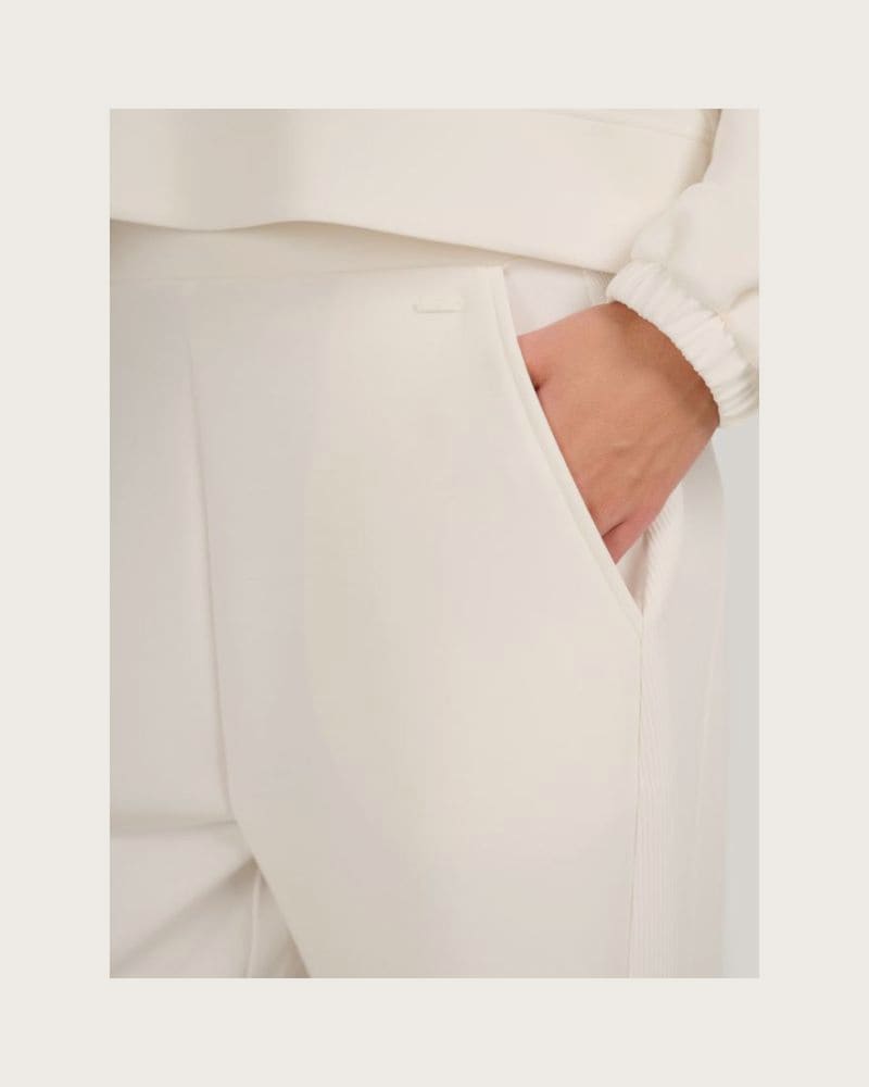 Dámske tepláky 4F TROUSERS CAS F1180-WAW25TTROF1180-11S-OFF WHITE – fotka 5