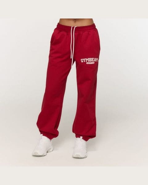 GymBeam Dámske tepláky Varsity Red L