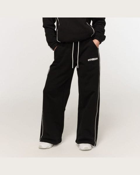 GymBeam Dámske tepláky Varsity Black XS