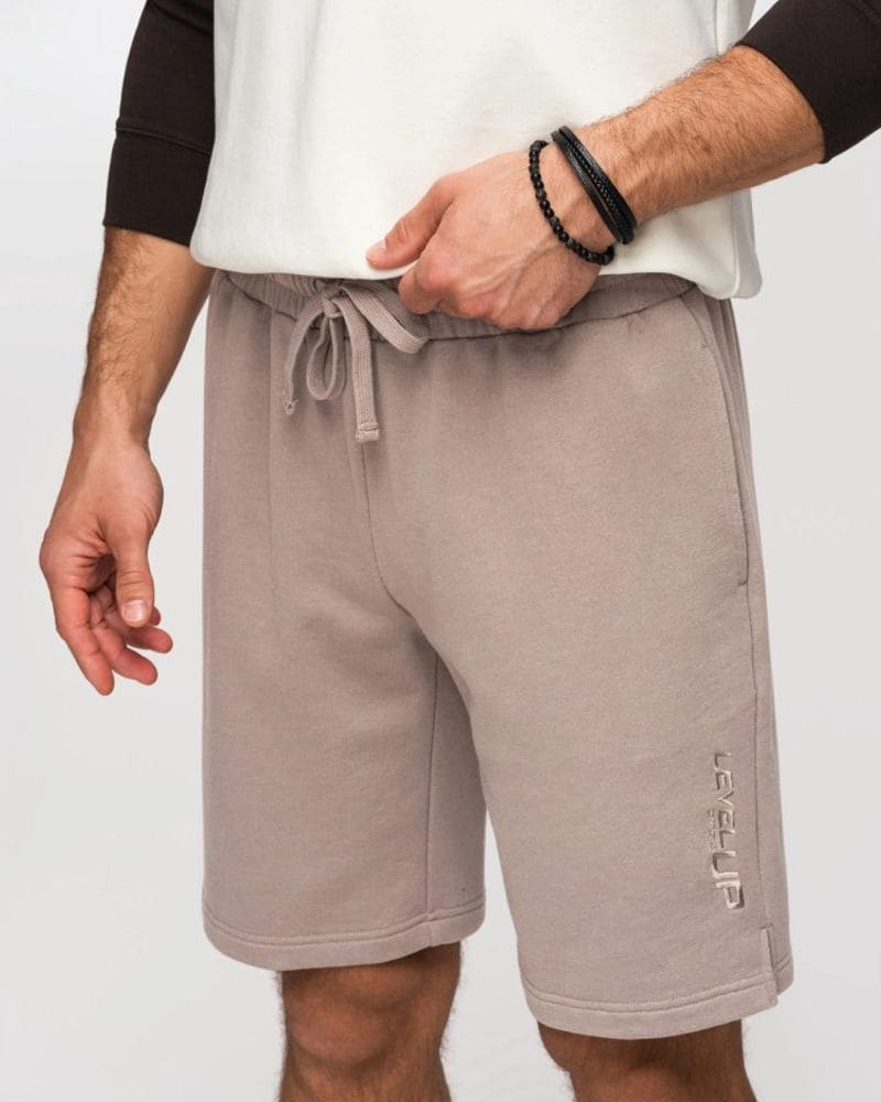 Trendy béžové kraťasy s logom