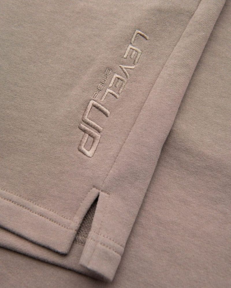 Trendy béžové kraťasy s logom – fotka 6