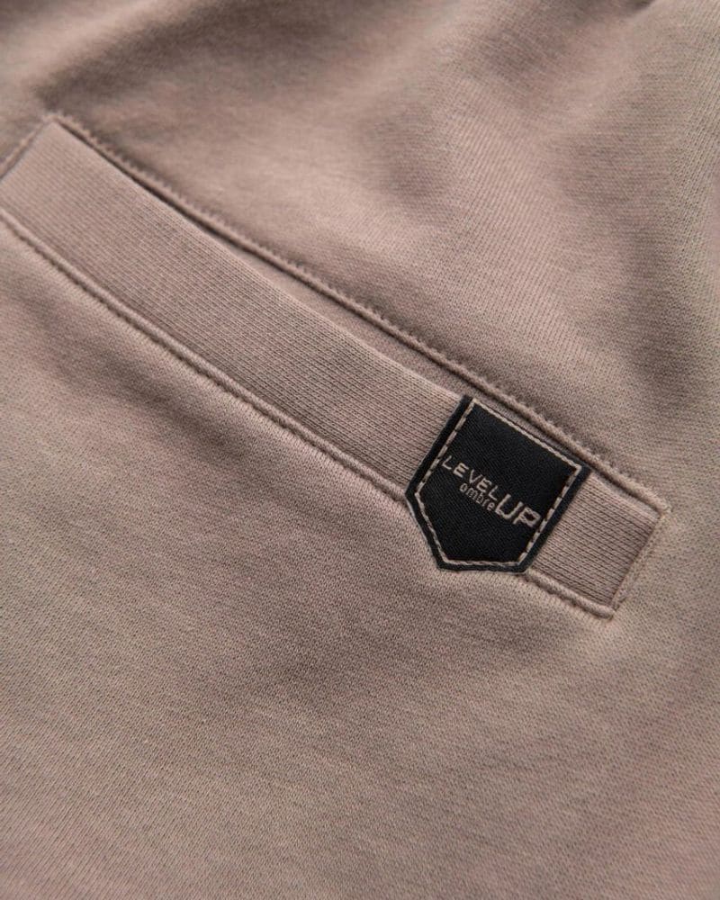 Trendy béžové kraťasy s logom – fotka 7